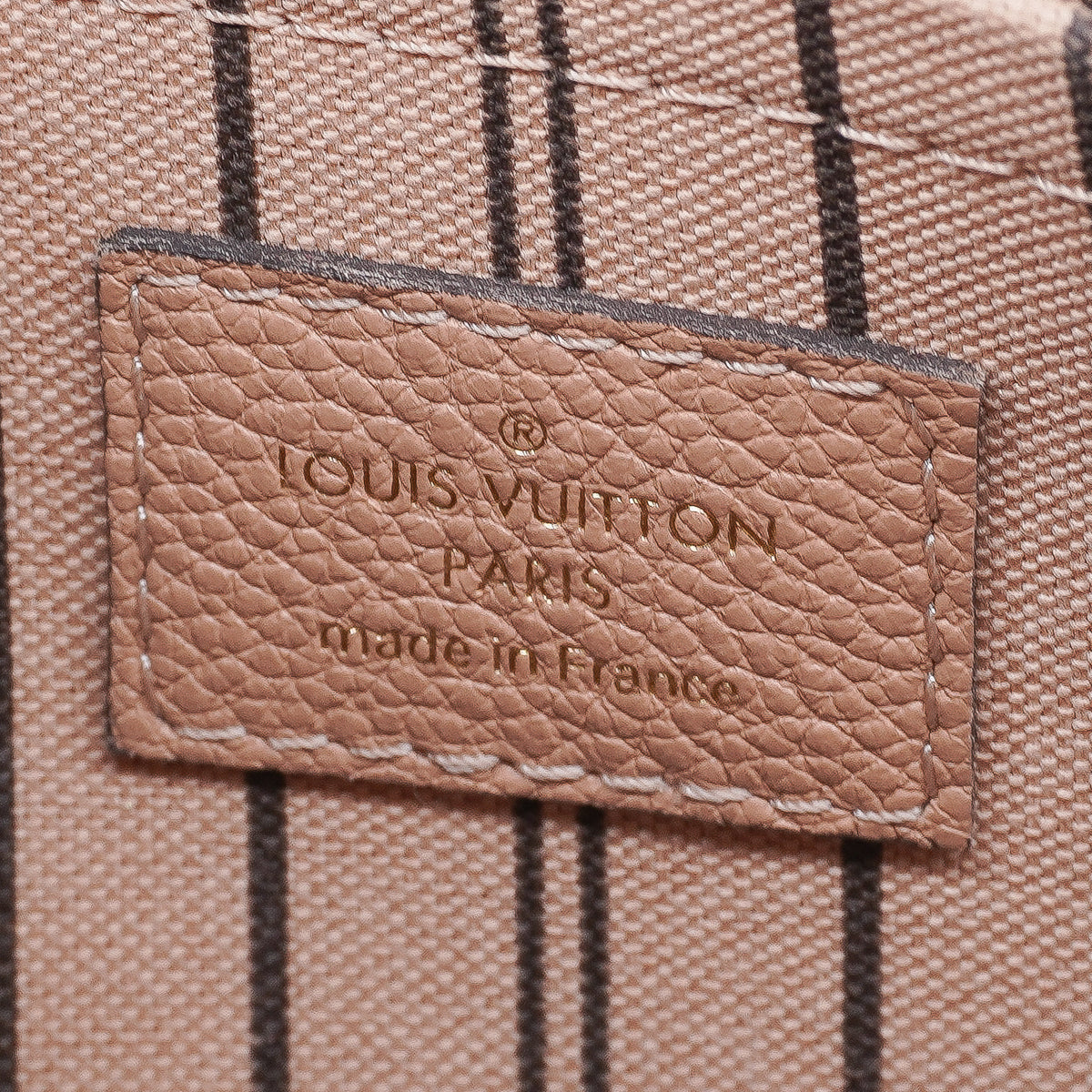 Louis Vuitton Montaigne MM Empreinte Tan